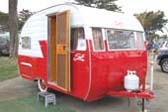 Very sharp 1956 Shasta Travel Trailer with vintage wide whitewall tires